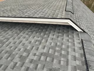 Close-up of architectural asphalt shingle courses